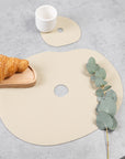Natural leather placemat and coaster, ivory